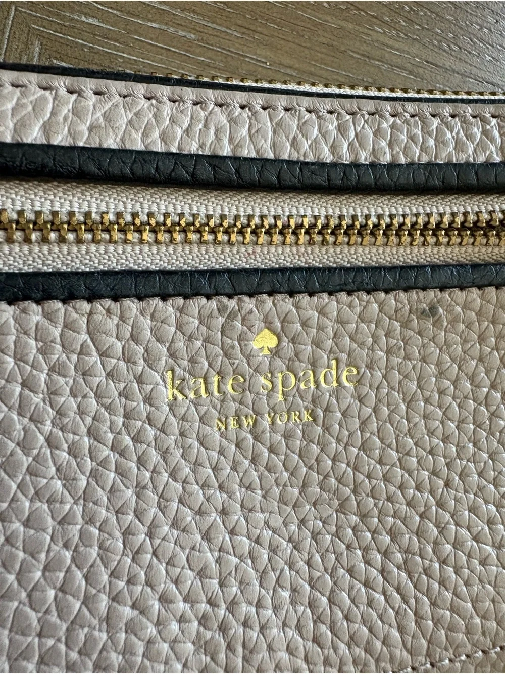 kate spade Blush Pebbled Leather Zip Wallet with Black Tassel